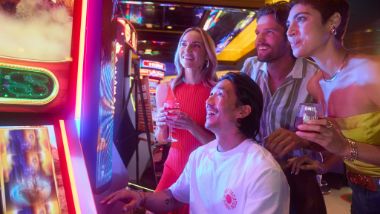 group of people on slot machines
